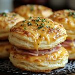 These Ham and Cheese Butter Swim Biscuits are the ultimate savory comfort food, combining tender biscuits with melted butter, ham, and cheddar cheese. Perfect for breakfast, brunch, or a snack!