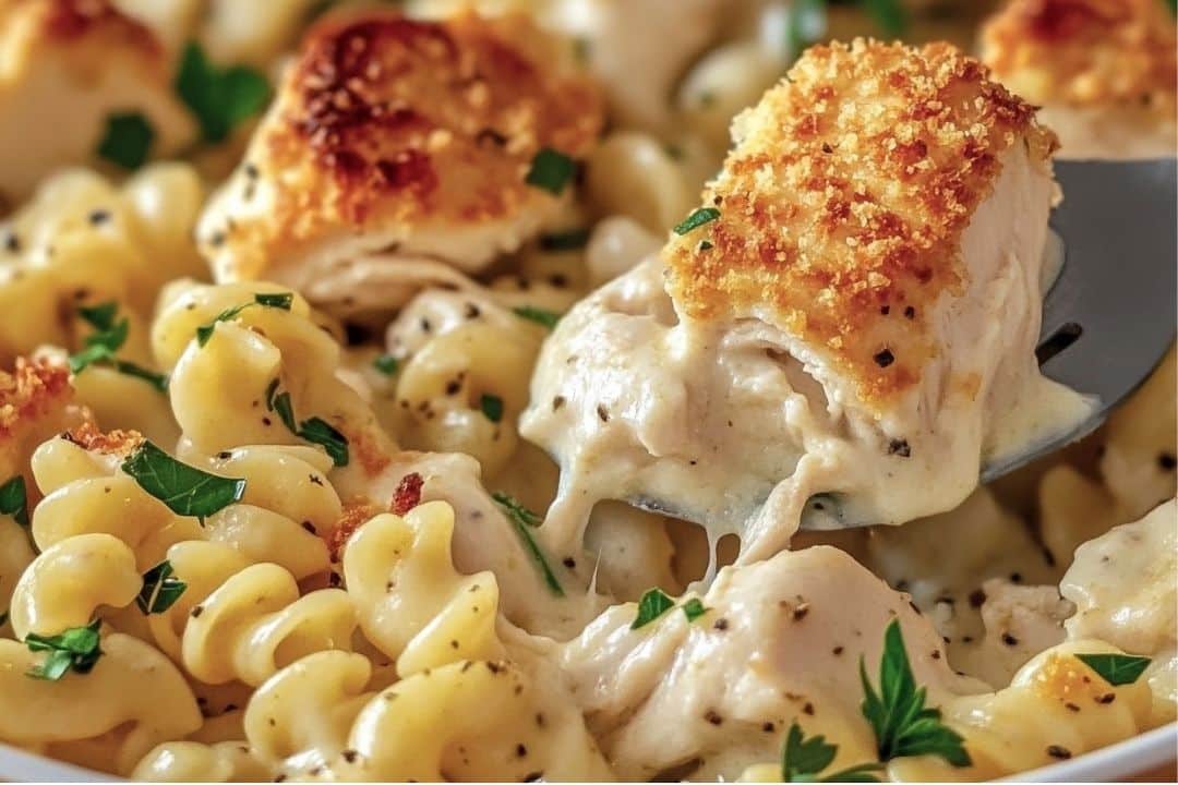 This creamy Garlic Parmesan Chicken Pasta Bake is the perfect comforting dish, loaded with tender chicken, gooey cheese, and a rich garlic parmesan sauce. It's quick to prepare and perfect for feeding a crowd or enjoying as leftovers.