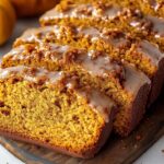 This Pumpkin Bread with Maple Glaze is packed with fall flavors, featuring a soft and moist pumpkin loaf, a crunchy pumpkin spice streusel topping, and a sweet maple glaze drizzled on top. Perfect for cozy autumn mornings or holiday gatherings.